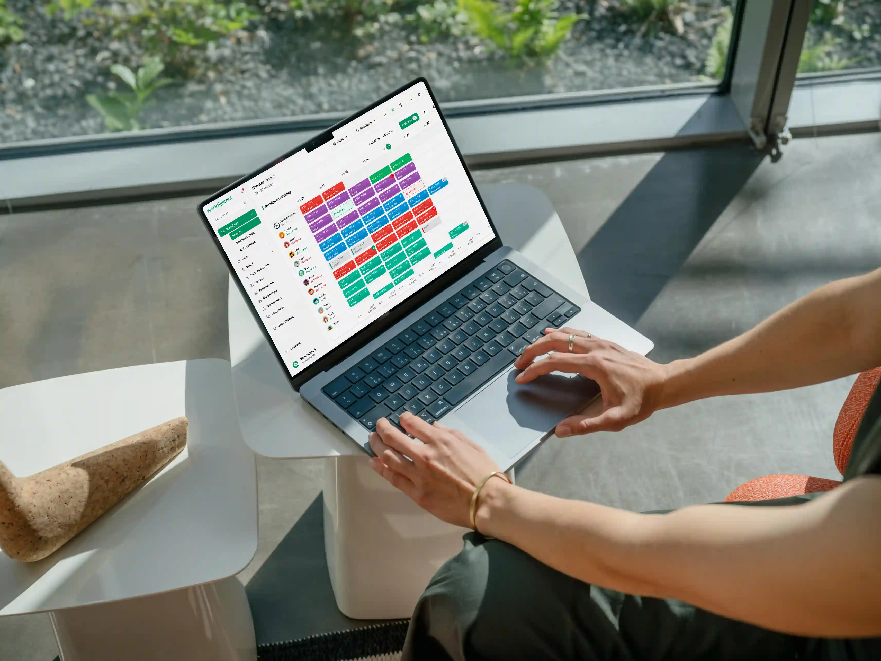 Mockuuups Free MacBook Pro with Female Professional_11zon (3)